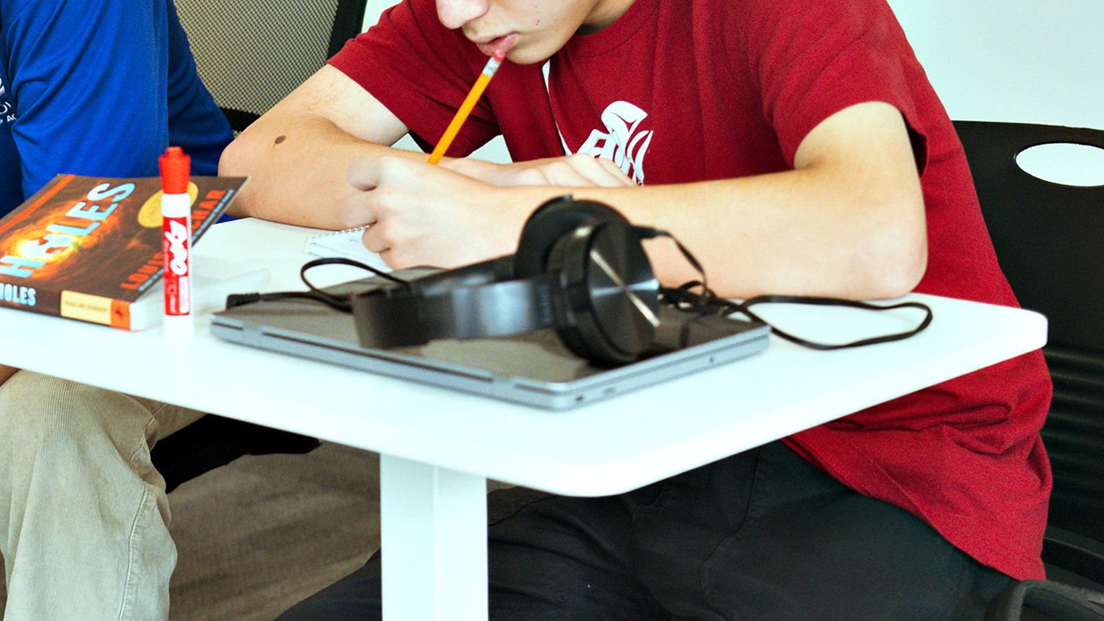 One-to-one instruction at Goodwin Learning Academy: a teacher and a student working together at a small table